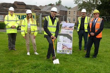 Cllr Ellison is pictured in the foreground with Robert Storey who will manage the new facility, Ruby Watt, a care-experienced young person, Kevin Turnbull, Director at JDDK Architects and Norman Trainer from Surgo Construction