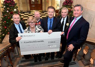 Cllr Tracey Dixon, Cllr Paul Dean and Mayor Cllr John McCabe receive the cheque from representatives of Barratt and Laydal 