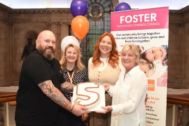 Lee and Claire Heslop are pictured with (second from left) Sarah Watson Fostering Network Mockingbird Coach, and Councillor Liz McHugh.