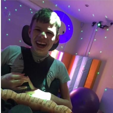 A young person using the Sensory Room at Foxden